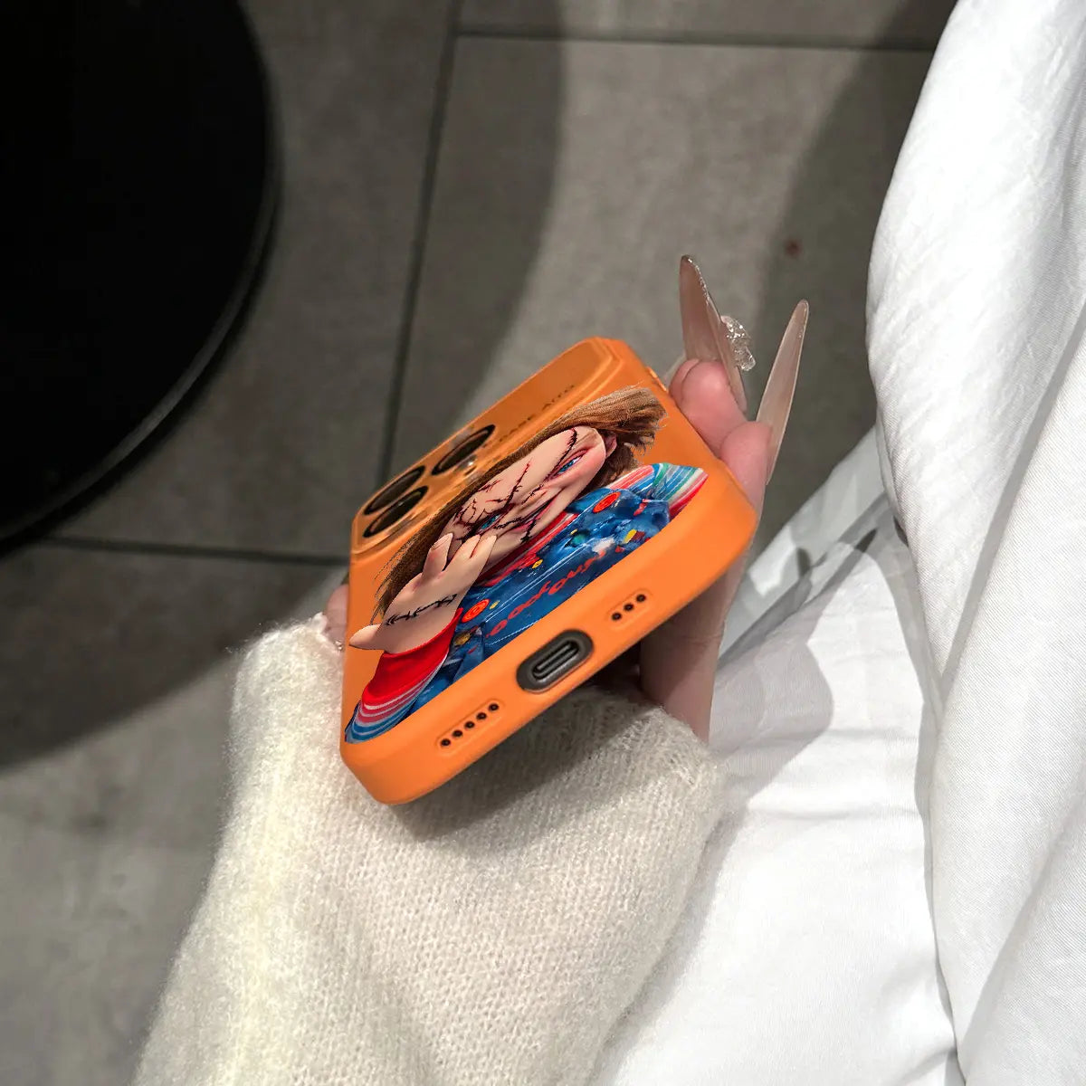 Chucky Creepy Gesture Pattern Dopamine Ins Style Solid Color Phone Case with Ultra Skin Friendly Touch, All Inclusive Lens Phone Case Suitable for Iphone 17 16 15 14 13 12 Pro Max Air